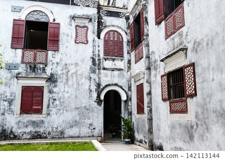 Traditional courtyard architecture facade of historic heritage building Mandarins House built in 1869 in Macau China Traditional courtyard architecture facade of historic heritage building Mandarins House built in 1869 in Macau China 142113144
