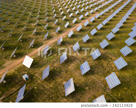 Photovoltaic solar panels at field, aerial photo Photovoltaic solar panels at field, aerial photo 142113928