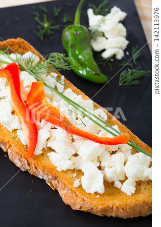Bulgarian toast with brinsen cheese, bell pepper 142113976