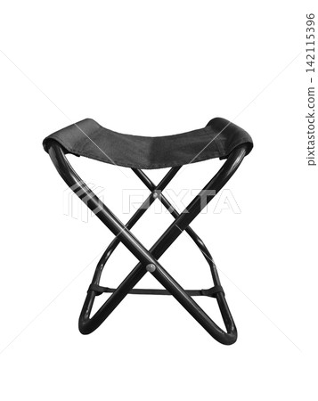 A black folding camping chair is placed on a white background. A black folding camping chair is placed on a white background. 142115396