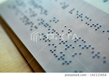 Braille Text with Raised Dots on Paper Braille Text with Raised Dots on Paper 142115858