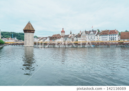 Famous historic Chapel Bridge and Water Tower on Reuss river in Lucerne, Switzerland. Beautiful panoramic view of Kapellbrucke landmark in summer. 12 June 2026, Lucerne, Switzerland Famous historic Chapel Bridge and Water Tower on Reuss river in Lucerne, Switzerland. Beautiful panoramic view of Kapellbrucke landmark in summer. 12 June 2026, Lucerne, Switzerland 142116089