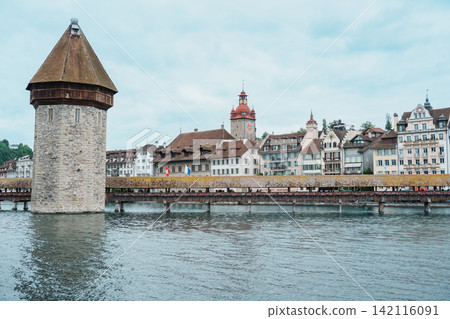 Famous historic Chapel Bridge and Water Tower on Reuss river in Lucerne, Switzerland. Beautiful panoramic view of Kapellbrucke landmark in summer. 12 June 2026, Lucerne, Switzerland Famous historic Chapel Bridge and Water Tower on Reuss river in Lucerne, Switzerland. Beautiful panoramic view of Kapellbrucke landmark in summer. 12 June 2026, Lucerne, Switzerland 142116091