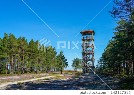 Wooden Observation Tower at Cape Kolka on the Baltic Sea Coast in Latvia Surrounded by Pine Forest Wooden Observation Tower at Cape Kolka on the Baltic Sea Coast in Latvia Surrounded by Pine Forest 142117835