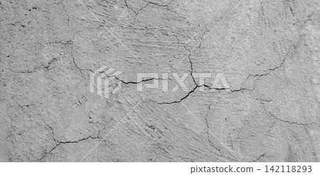 Cracked gray concrete plaster texture Cracked gray concrete plaster texture 142118293