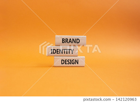 Brand identity design symbol. Concept word Brand identity design on wooden blocks. Beautiful orange background. Business and Brand identity design. Copy space Brand identity design symbol. Concept word Brand identity design on wooden blocks. Beautiful orange background. Business and Brand identity design. Copy space 142120963
