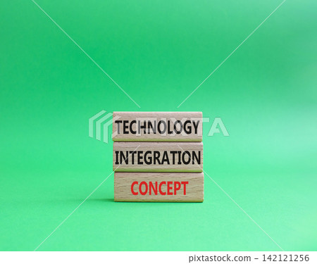 Technology integration concept symbol. Concept word Technology integration concept on wooden blocks. Beautiful green background. Business and Technology integration concept. Copy space 142121256