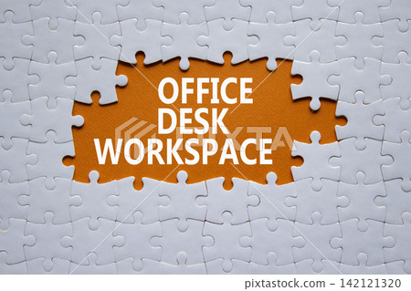 Office Desk Workspace symbol. White puzzle with words Office Desk Workspace. Beautiful orange background. Business concept. Copy space. Office Desk Workspace symbol. White puzzle with words Office Desk Workspace. Beautiful orange background. Business concept. Copy space. 142121320