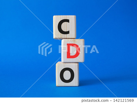 CDO - Collateralized Debt Obligation symbol. Wooden cubes with word CDO. Beautiful blue background. Business and Collateralized Debt Obligation concept. Copy space. CDO - Collateralized Debt Obligation symbol. Wooden cubes with word CDO. Beautiful blue background. Business and Collateralized Debt Obligation concept. Copy space. 142121569