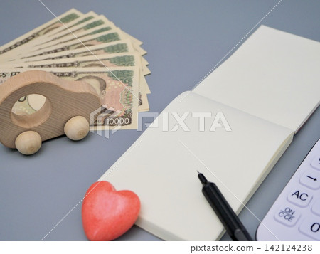 Japanese yen, notepad, pen, heart, calculator, miniature car Japanese yen, notepad, pen, heart, calculator, miniature car 142124238