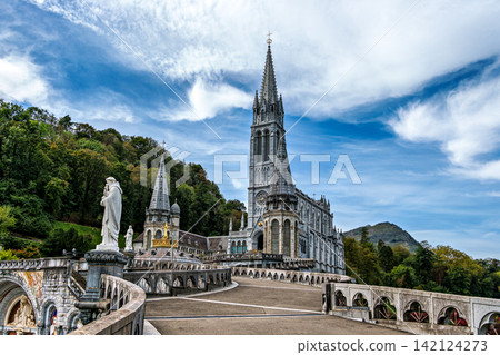 View of the Basilica in the Sanctuary of Lourdes, France. Mayor pilgrimage spot for Catholics View of the Basilica in the Sanctuary of Lourdes, France. Mayor pilgrimage spot for Catholics 142124273