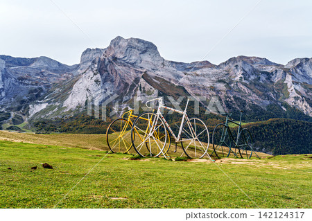 Huge bicycles in honor of the winners of the Tour de France Cycling race at the top of Col d'Aubisque in France Huge bicycles in honor of the winners of the Tour de France Cycling race at the top of Col d'Aubisque in France 142124317