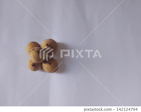 Fresh Langsat Fruit Lansium domesticum on Wooden Table copy space 142124704