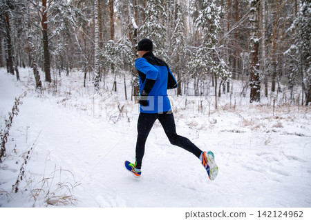 Man athlete running trail race Man athlete running trail race 142124962