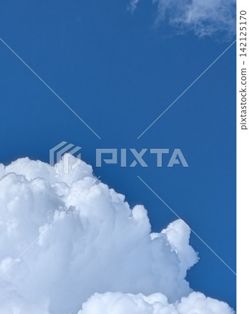 Summer sky with blue skies and towering cumulonimbus clouds Summer sky with blue skies and towering cumulonimbus clouds 142125170