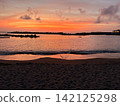 Sea stained at sunset 142125298