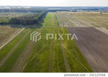 sown agricultural field, view from above sown agricultural field, view from above 142125508
