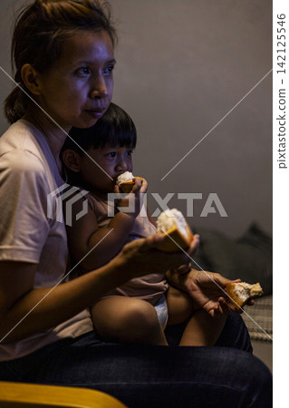 Mom And Toddler Are Eating Santol Mom And Toddler Are Eating Santol 142125546