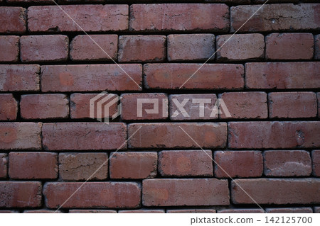 brick wall stationary in neutral setting with concrete bricks and mortar, straight-on view, red and brown tones, modern architectural background, clean and detailed construction. brick wall stationary in neutral setting with concrete bricks and mortar, straight-on view, red and brown tones, modern architectural background, clean and detailed construction. 142125700
