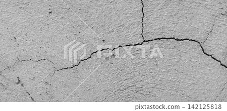 Cracked light gray concrete wall texture Cracked light gray concrete wall texture 142125818