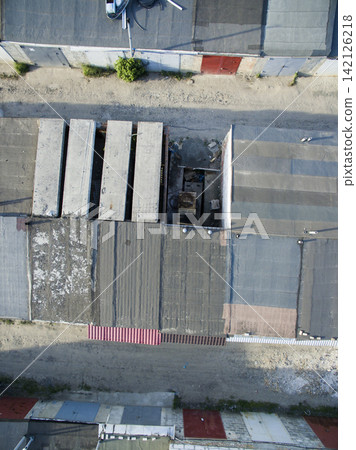 roof of garages, view from above roof of garages, view from above 142126218