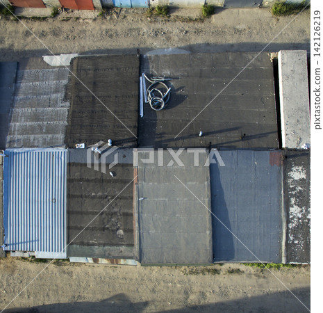roof of garages, view from above roof of garages, view from above 142126219
