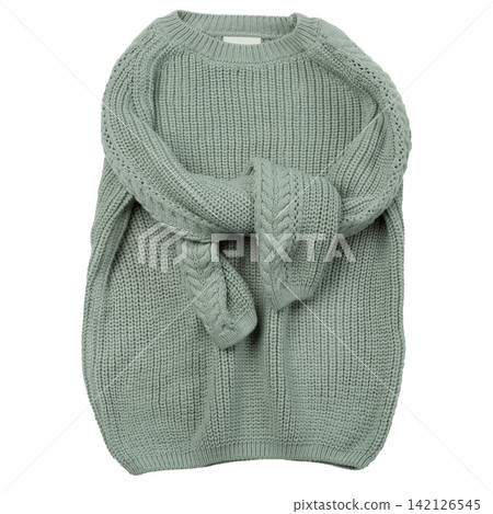 Sage green chunky knitted sweater with sleeves crossed isolated on white background. Warm winter wool pullover flat lay top view studio shot Sage green chunky knitted sweater with sleeves crossed isolated on white background. Warm winter wool pullover flat lay top view studio shot 142126545