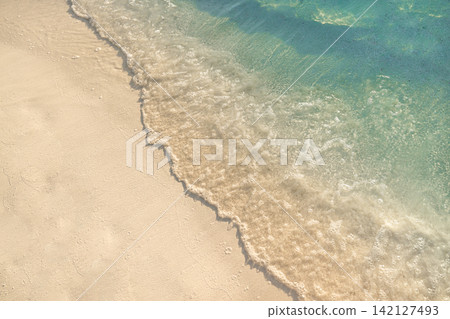 Serene overhead soft foam wave sliding powdery shore glassy azure tropical shallows minimal gradient. Seascape design backdrop scenic. Coastal drone abstract wallpaper wall art Serene overhead soft foam wave sliding powdery shore glassy azure tropical shallows minimal gradient. Seascape design backdrop scenic. Coastal drone abstract wallpaper wall art 142127493