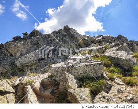Todorka Pirin Mountains Bulgaria rugged granite rocks boulders and alpine hiking trail near Bansko Todorka Pirin Mountains Bulgaria rugged granite rocks boulders and alpine hiking trail near Bansko 142127545