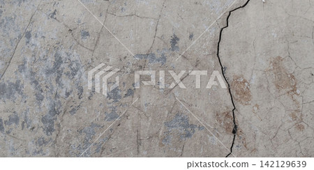 Cracked and peeling concrete wall texture Cracked and peeling concrete wall texture 142129639