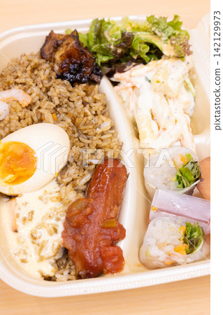 Delicious nasi goren lunches Delicious nasi goren lunches 142129973