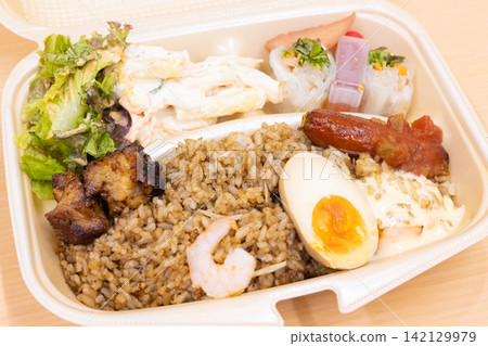 Delicious nasi goren lunches Delicious nasi goren lunches 142129979