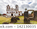 Church surrounded by stone ruins 142130035