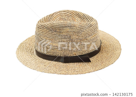 Hat made of woven straw isolated on white background. Hat made of natural material. Straw sun hat. Eco-friendly fashion accessory. Hat made of woven straw isolated on white background. Hat made of natural material. Straw sun hat. Eco-friendly fashion accessory. 142130175