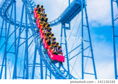 Amusement park roller coaster (blurred image) Amusement park roller coaster (blurred image) 142130188