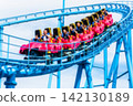 Amusement park roller coaster (blurred image) 142130189