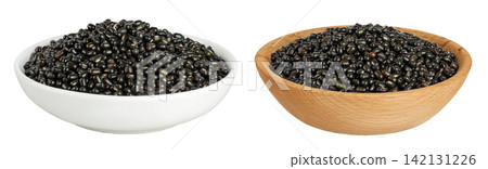 Black bean or Urad dal, black gram, vigna mungo in ceramic and wooden bowl isolated on the white background Black bean or Urad dal, black gram, vigna mungo in ceramic and wooden bowl isolated on the white background 142131226
