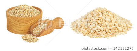 Sesame seeds in wooden bowl and scoop isolated on white background Sesame seeds in wooden bowl and scoop isolated on white background 142131275