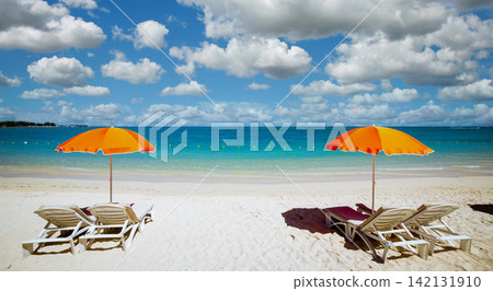 Parasols and beach in Mauritius island Parasols and beach in Mauritius island 142131910