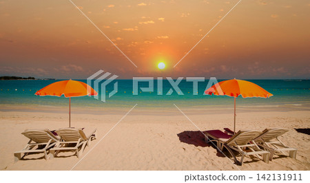 Parasols and beach in Mauritius island Parasols and beach in Mauritius island 142131911