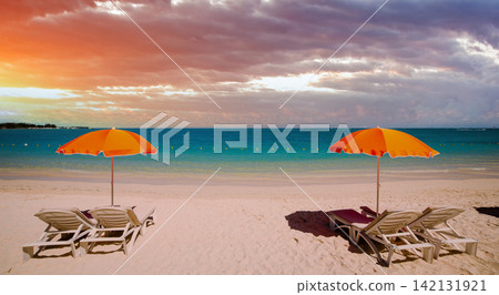 Parasols and beach in Mauritius island Parasols and beach in Mauritius island 142131921