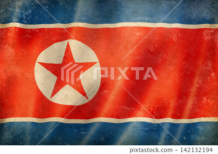 Old vintage flag of North Korea, worn and stained Old vintage flag of North Korea, worn and stained 142132194