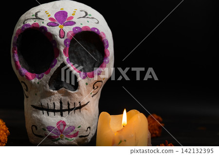 Day of the Dead Sugar Skull Still Life with Marigolds, Candles, and Floral Motifs Day of the Dead Sugar Skull Still Life with Marigolds, Candles, and Floral Motifs 142132395