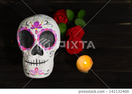 Dia de los Muertos Sugar Skull Still Life with Marigolds, Roses, and Text Space Dia de los Muertos Sugar Skull Still Life with Marigolds, Roses, and Text Space 142132400