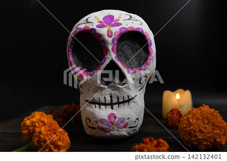 Day of the Dead Hand-Painted Calavera Still Life with Marigolds and Candlelight Day of the Dead Hand-Painted Calavera Still Life with Marigolds and Candlelight 142132401