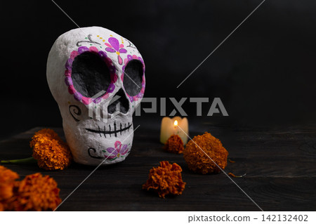 Day of the Dead Sugar Skull Still Life with Marigolds and Candlelight 142132402