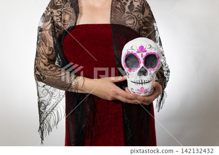 Day of the Dead Inspired Portrait: Woman with Hand-Painted Calavera in Studio 142132432
