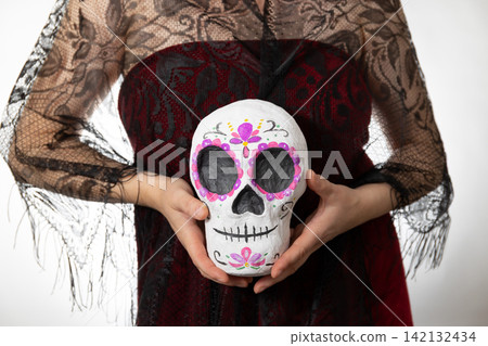 Dia de los Muertos Calavera Portrait with Handpainted Sugar Skull, Lace, on White Backdrop 142132434
