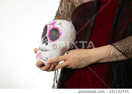 Day of the Dead Calavera Held with Velvet and Floral Motifs for Remembrance 142132435