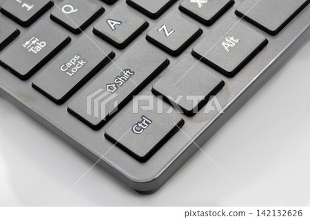 Computer keyboard with Shift, Ctrl, Alt keys on white background. Computer keyboard with Shift, Ctrl, Alt keys on white background. 142132626
